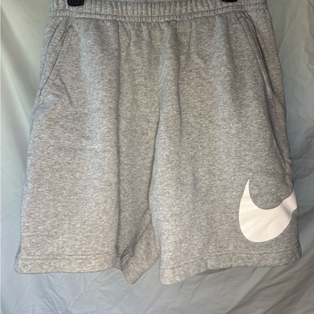 Nike Gray Athletic Shorts with White Swoosh